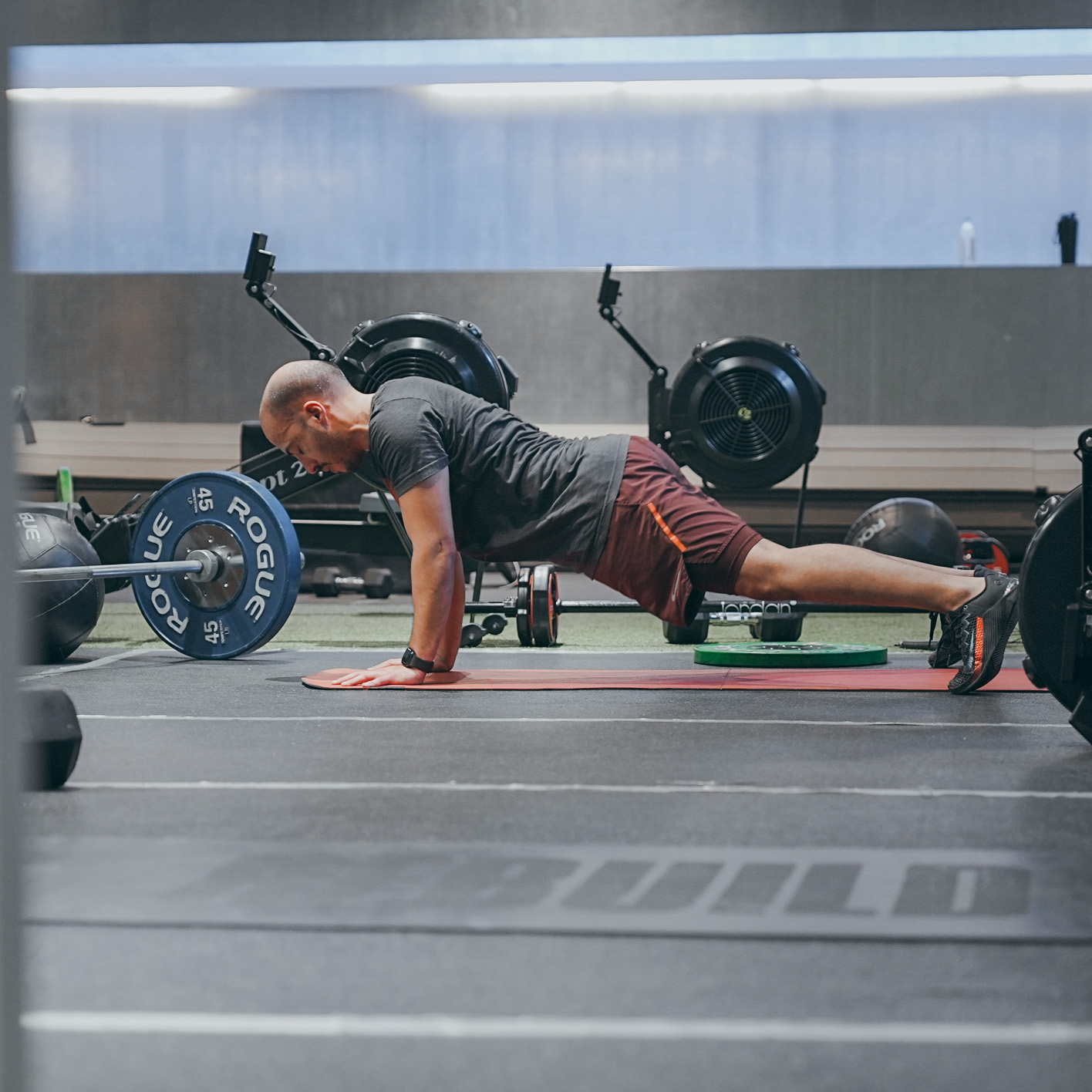 Core strength training session with athletes using various equipment